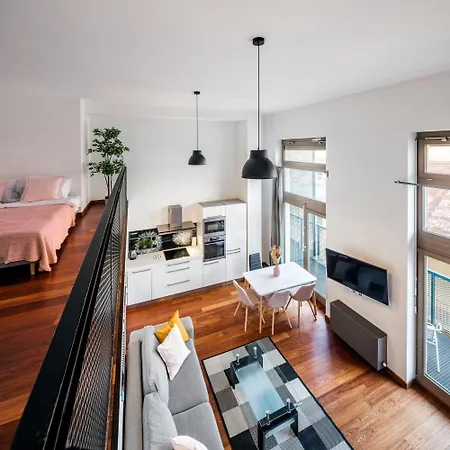 Family With Balcony In Center Of